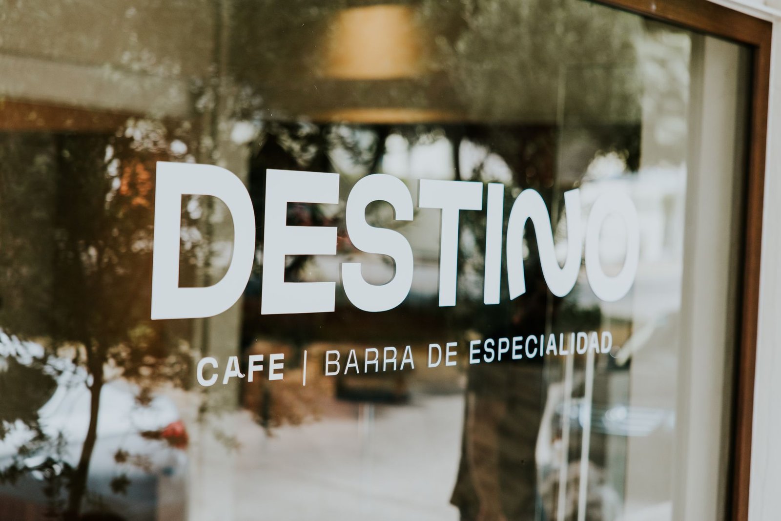 close up view of cafe destino sign