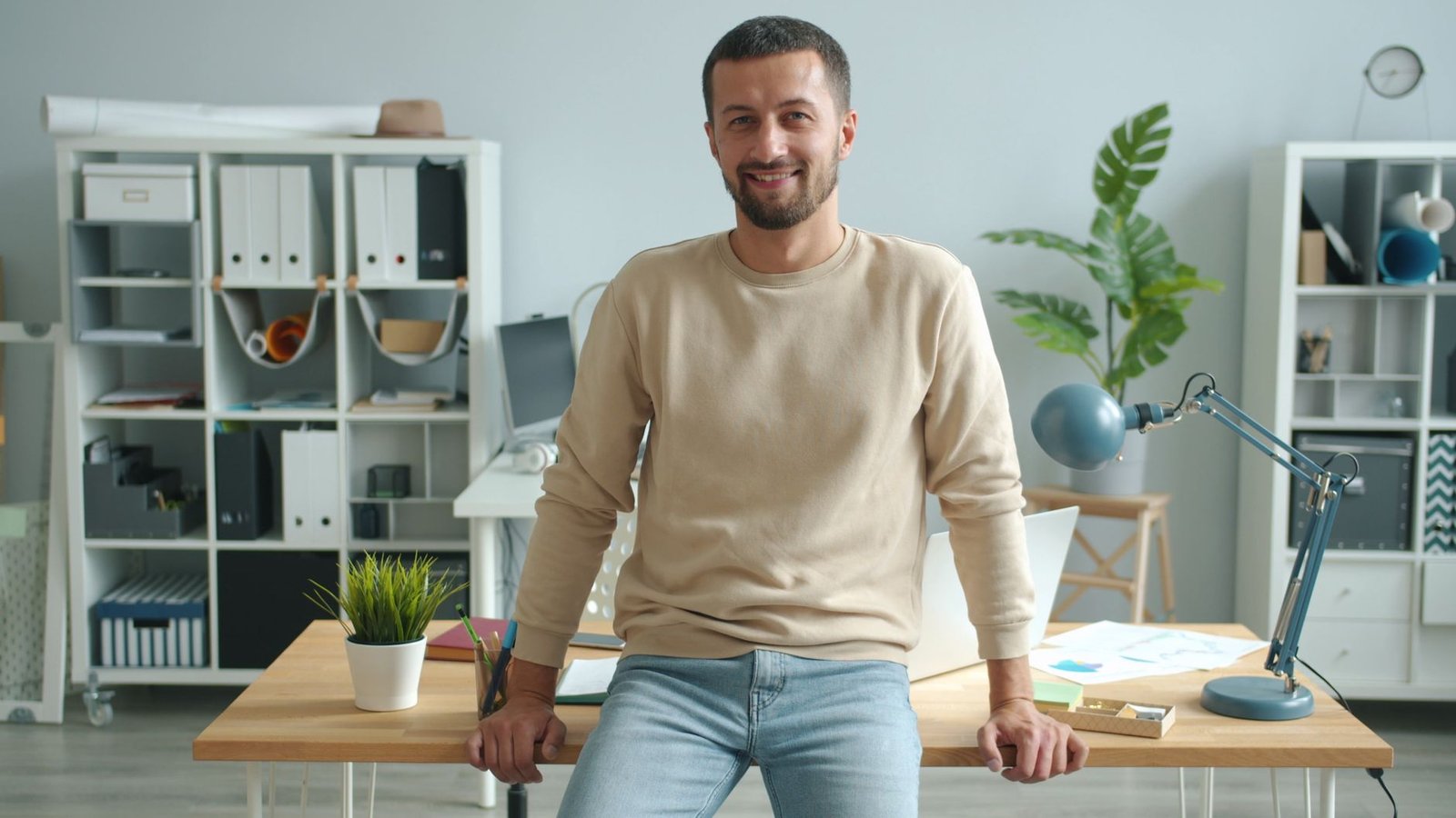 smiling man in modern office interior